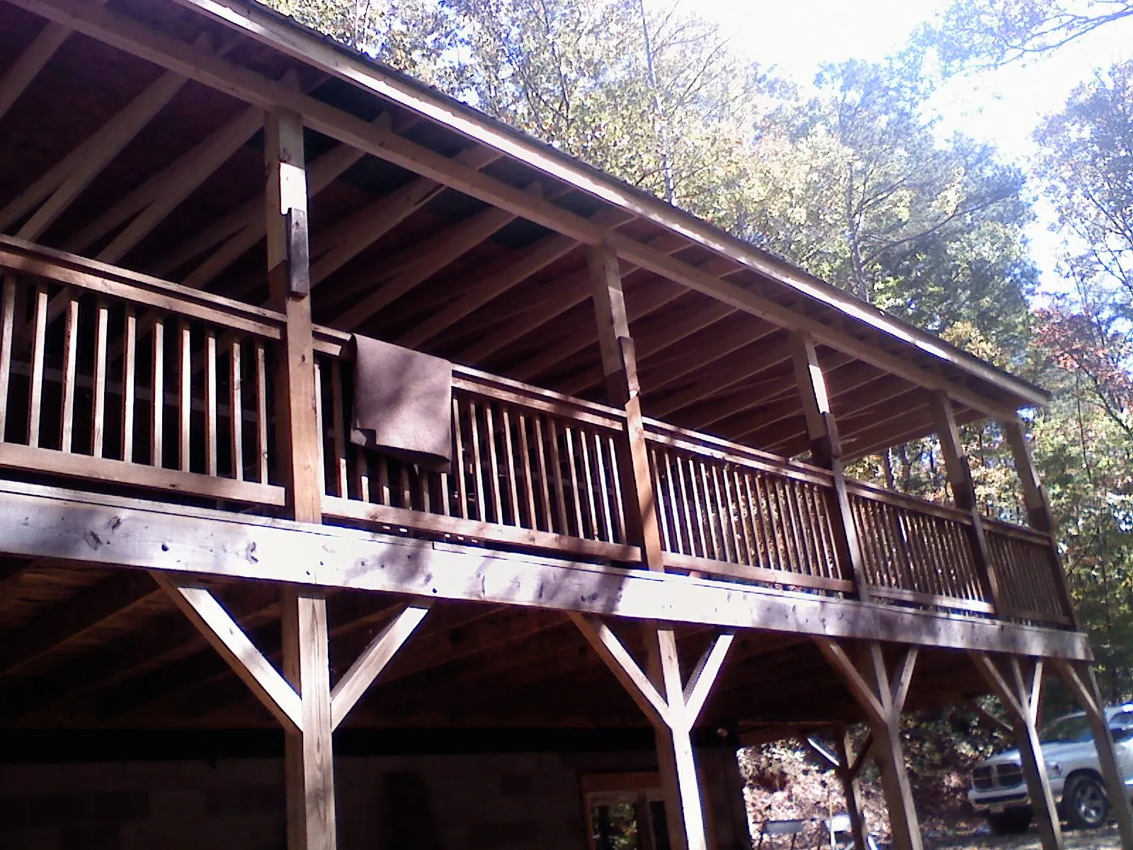 Timber framing under a new elevated porch and deck — Roof Leak Repair in Glendo by Roofing Brothers